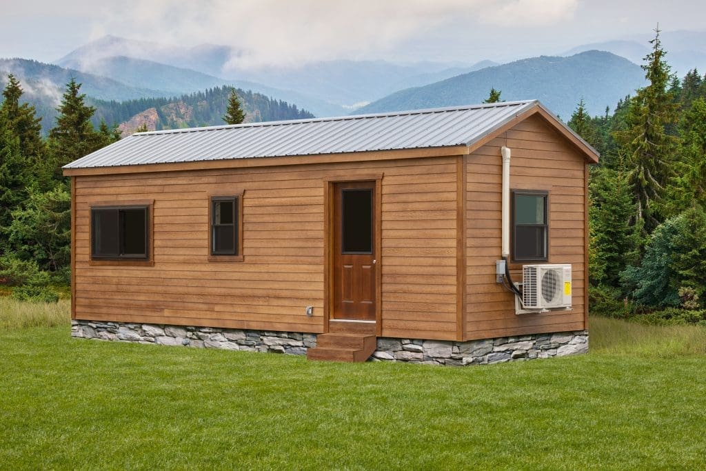 a side view of a cabin out in nature